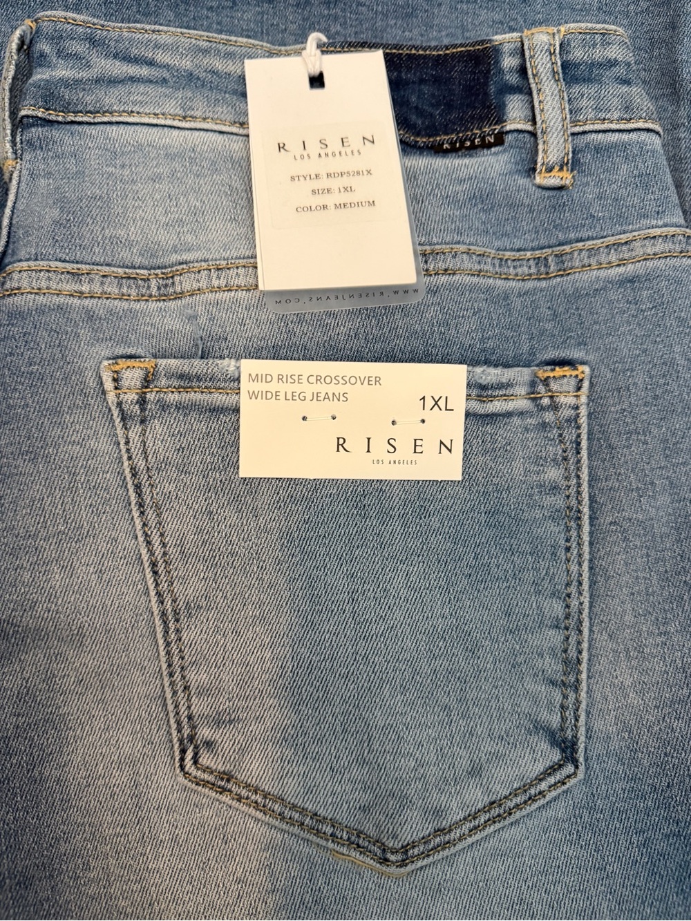 Risen Mid-Rise Crossover Wide Leg Jeans in Medium Blue